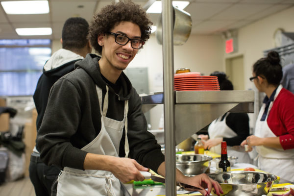 Alex Irizzary Jr., 2015 ExpandED Teen Apprentice and current TSC Chef Assistant, practicing his brunoise dice on beets for a salad