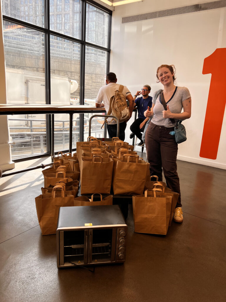 The Sylvia Center staff pack meal kit bags for Knights Table Pantry