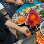 The Sylvia Center Teen Culinary Apprentices test student recipes for the Art of Cooking gala in March 2026