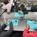 Kids in The Sylvia Center cooking class at Grand Street Settlement at Rutgers Community Center