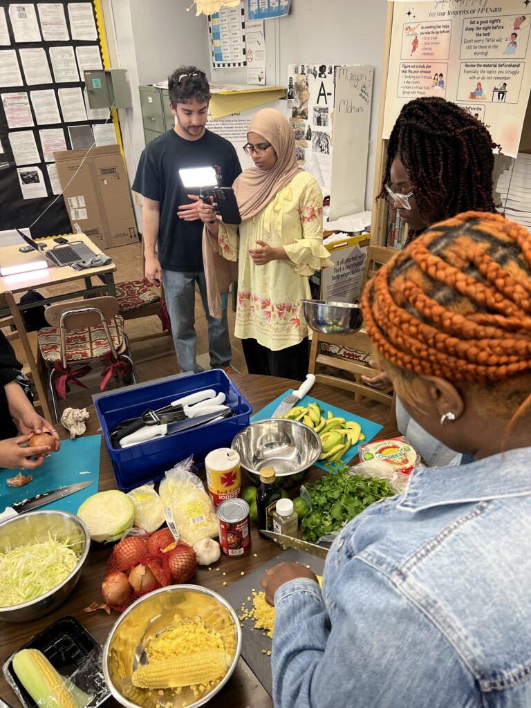Eater's Sergio Cardigno teaches The Sylvia Center's teen culinary apprentices about food videography