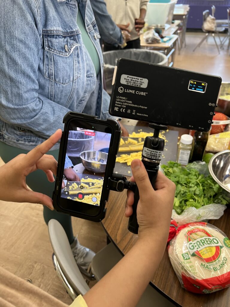 Eater's Sergio Cardigno teaches The Sylvia Center's teen culinary apprentices about food videography