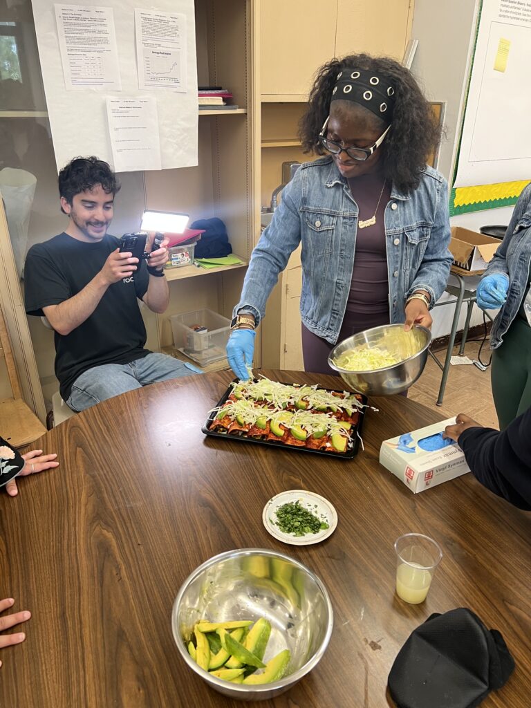 Eater's Sergio Cardigno teaches The Sylvia Center's teen culinary apprentices about food videography